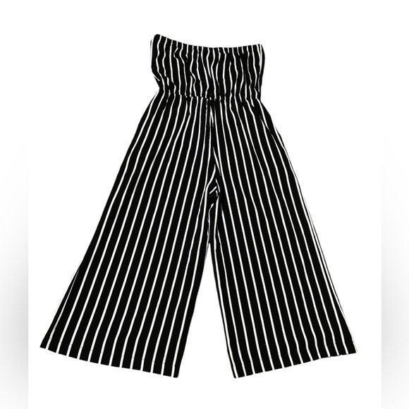 Black and white striped jumpsuit with flared leg and strapless top - Picture 2 of 3